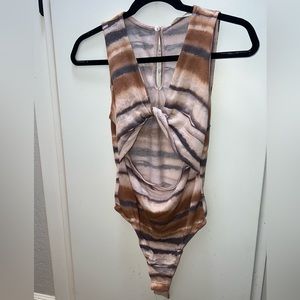 Tie dye style with cut out bodysuit.